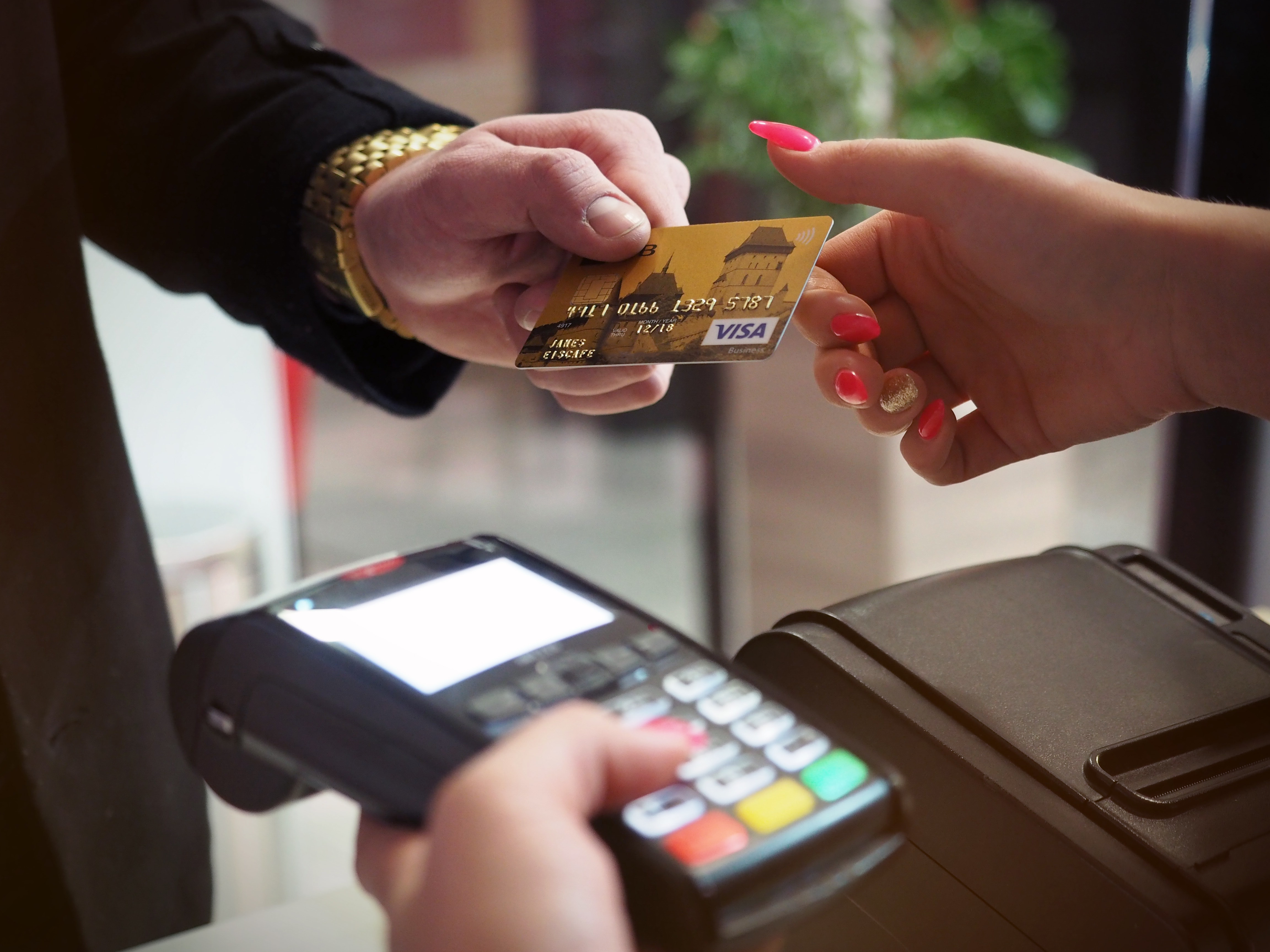 photo-of-person-handing-card-2988232 photo-of-person-handing-card-2988232